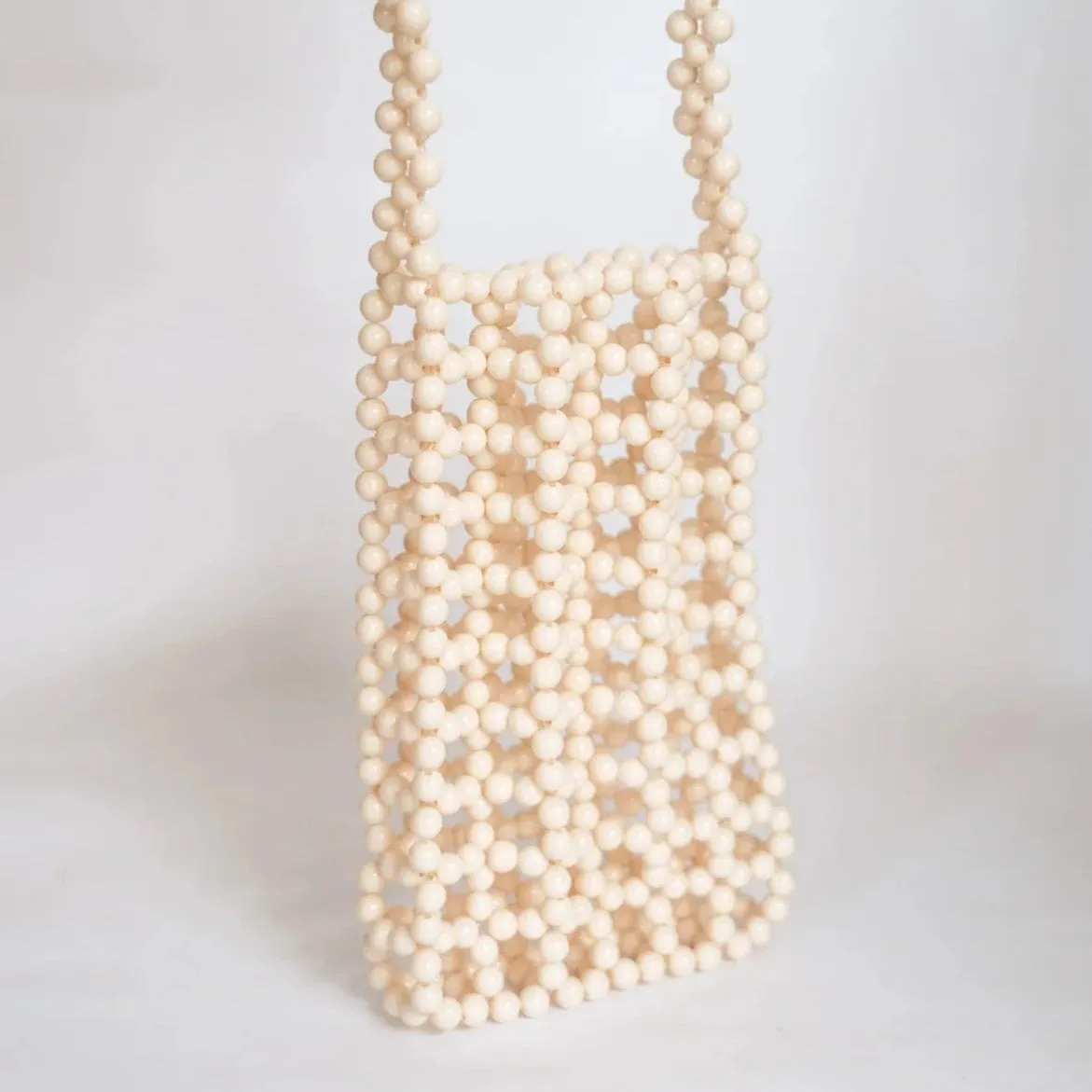 HIBISCUS THE LABEL BEADED PHONE BAG: CREAM