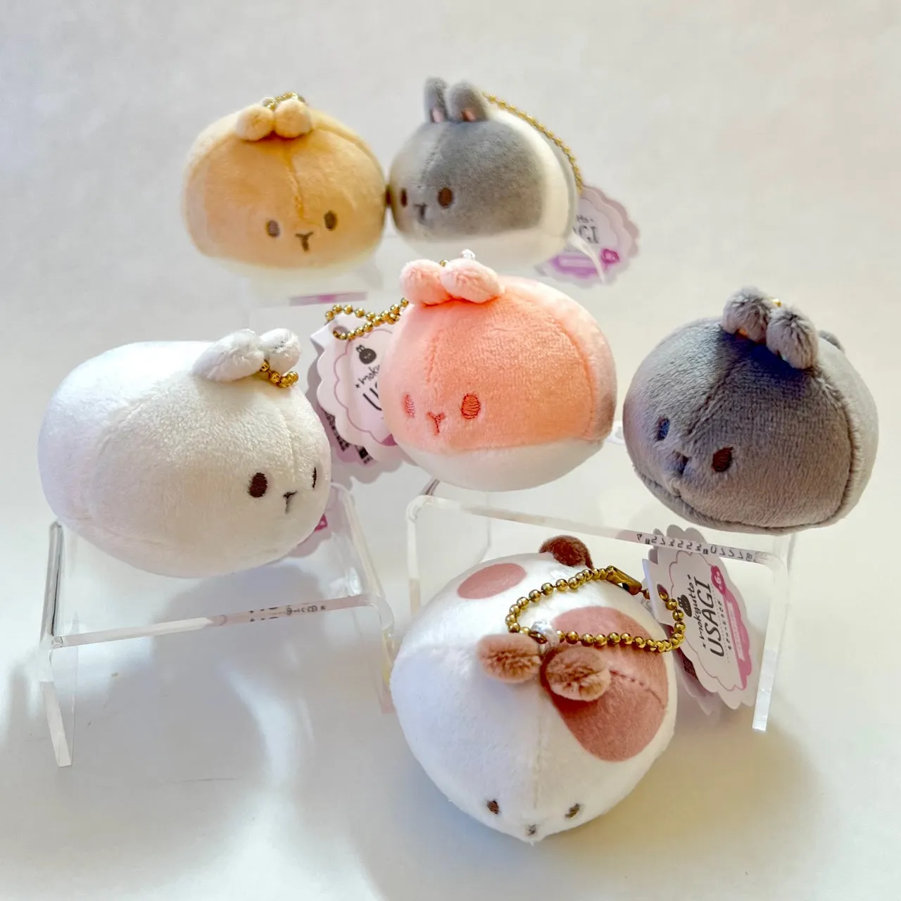 X 63418 ROUND RABBIT PLUSH CHARMS-DISCONTINUED